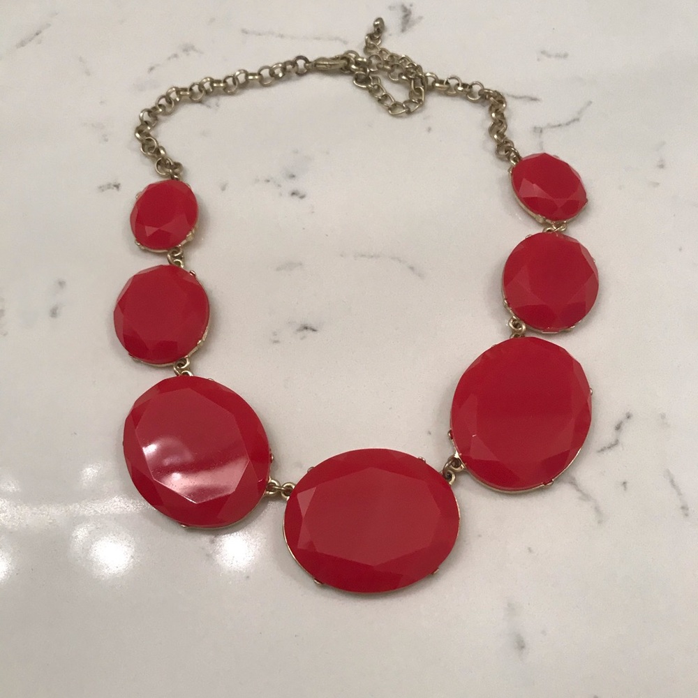 Red linked statement necklace.